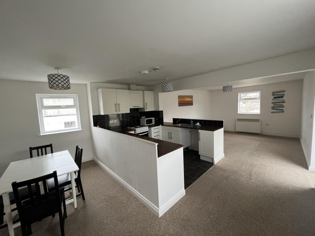Lot: 89 - FREEHOLD INVESTMENT OF SEVEN APARTMENTS - General view of Flat 7 open plan living-kitchen-dining room